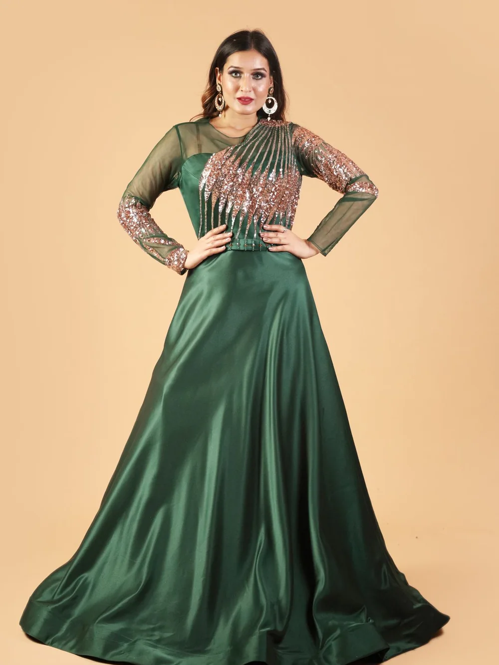 Woman in a green satin evening gown