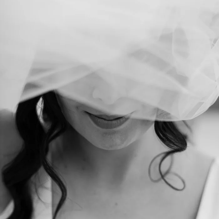 Bride under a veil, black and white
