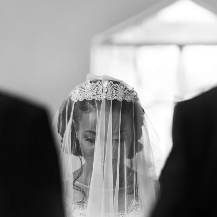 Bride with a veil at a ceremony
